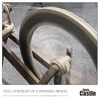 Still Portrait of a Spinning Wheel - EP