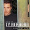 A Man Holdin' On (To a Woman Lettin' Go) - Ty Herndon lyrics