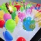 Push balls to pop the balloons